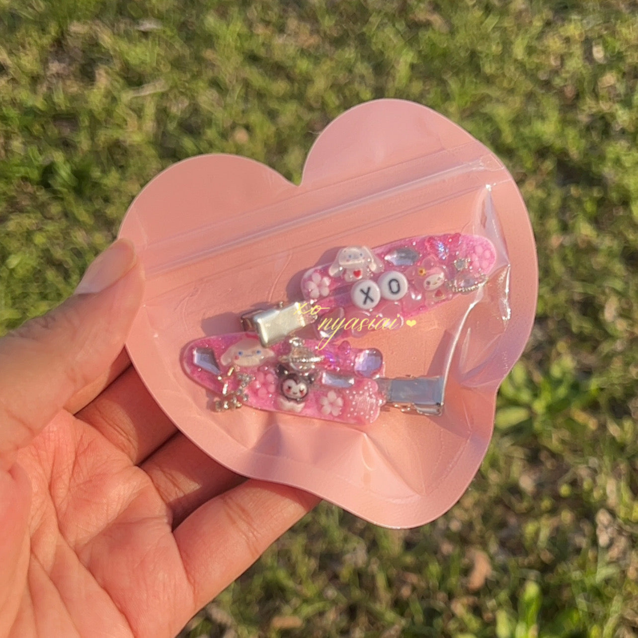 Pink xo hair clips